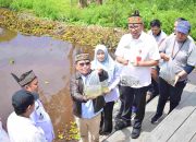 Restocking Ikan Bapuyu di Danau Tahai Tingkatkan Ketahanan Pangan