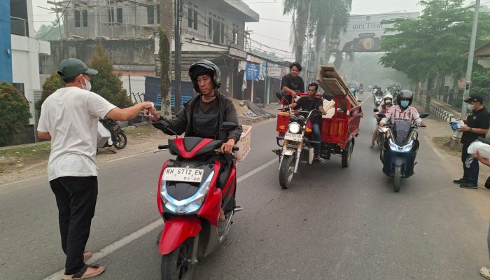 Kabut Asap Pekat, PWI Barito Utara Peduli Kesehatan Warga
